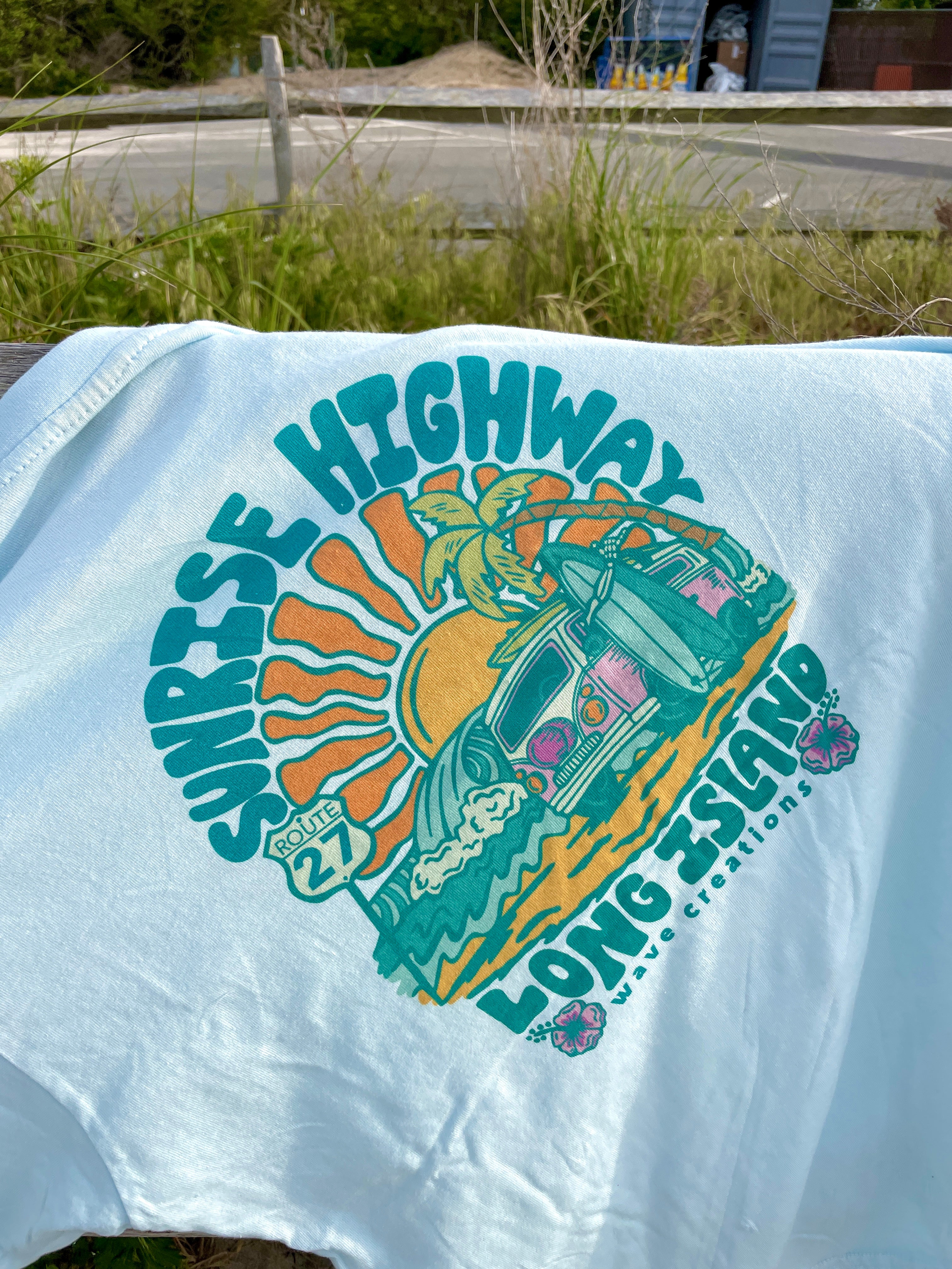 Sunrise Highway T shirt, hanging up